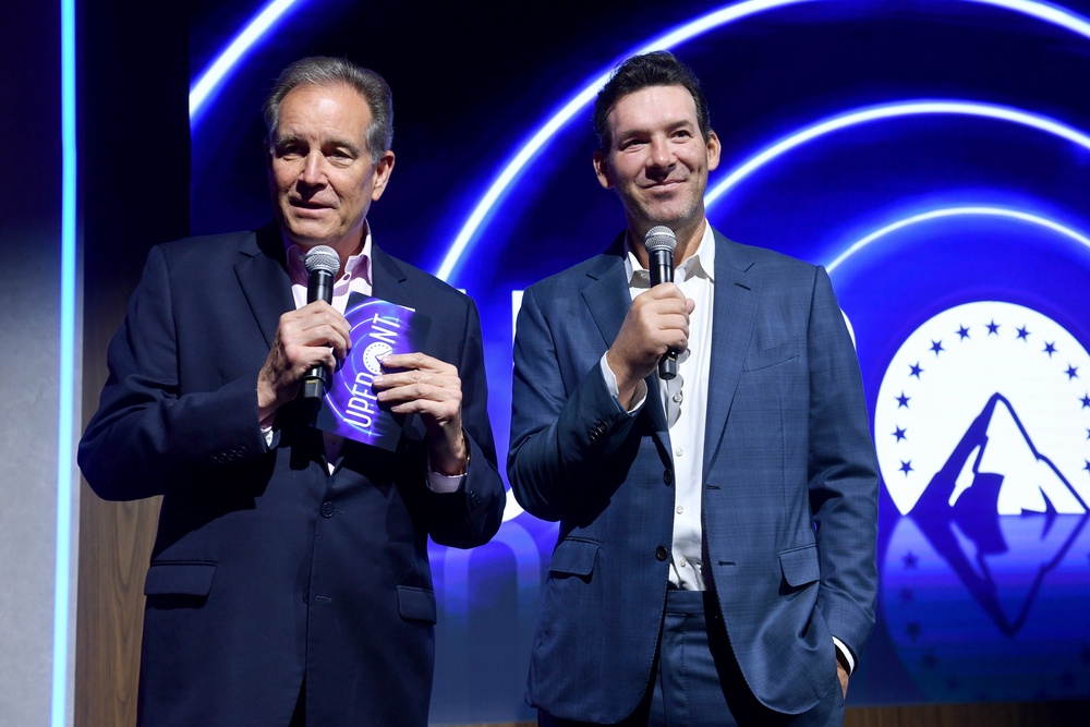 CBS Sports placed Romo (right) on leave from his primary position as the network's lead game analyst after his arrest (Getty Images for Paramount)