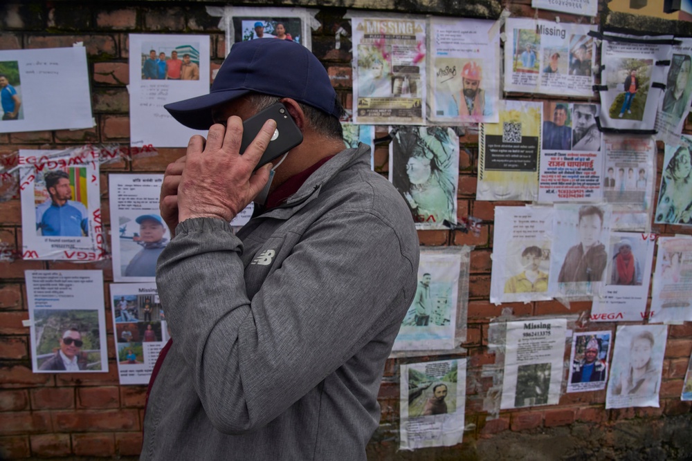 A rapid deployment team was dispatched to Nepal to assist those seeking information about missing relatives (AP Photo/Niranjan Shrestha) (AP)