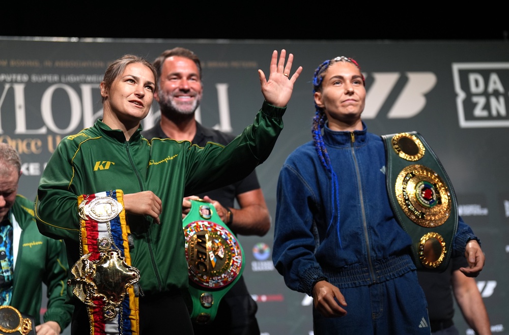 Katie Taylor, left, and Flora Pili, right, face off (Niall Carson/PA) (PA Wire)