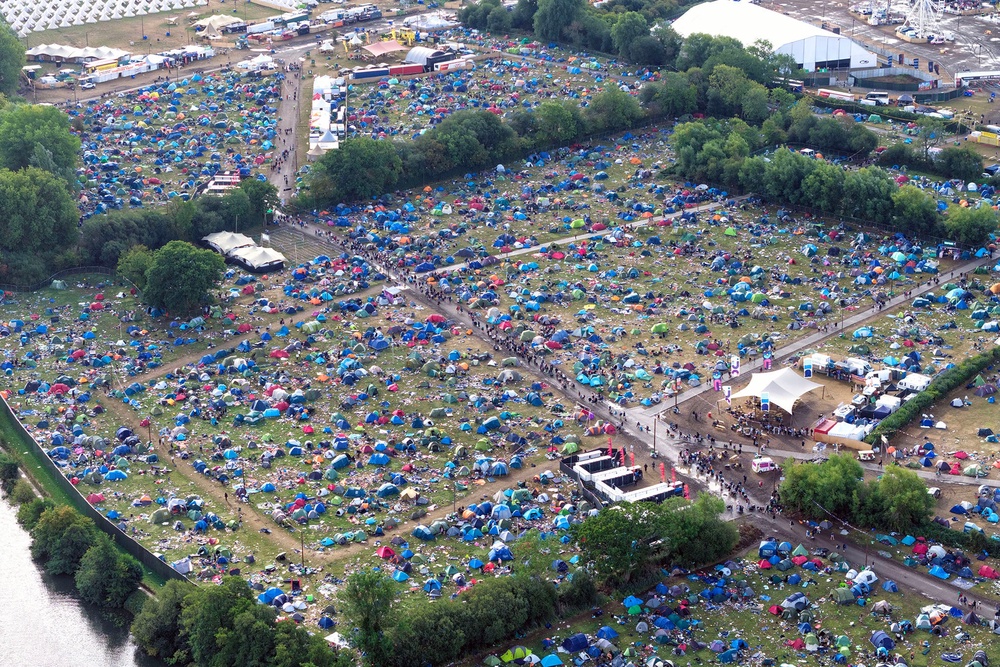 Broken tents, sleeping bags, and blow-up mattresses can be seen in drone footage (Chris Gorman/Big Ladder)