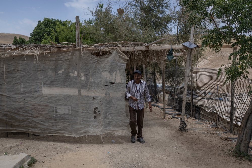 A Palestinian Bedouin man walks in the Bedouin community of Khan al-Ahmar in the Israeli-occupied West Bank on May 20, 2026 (AFP/Getty)