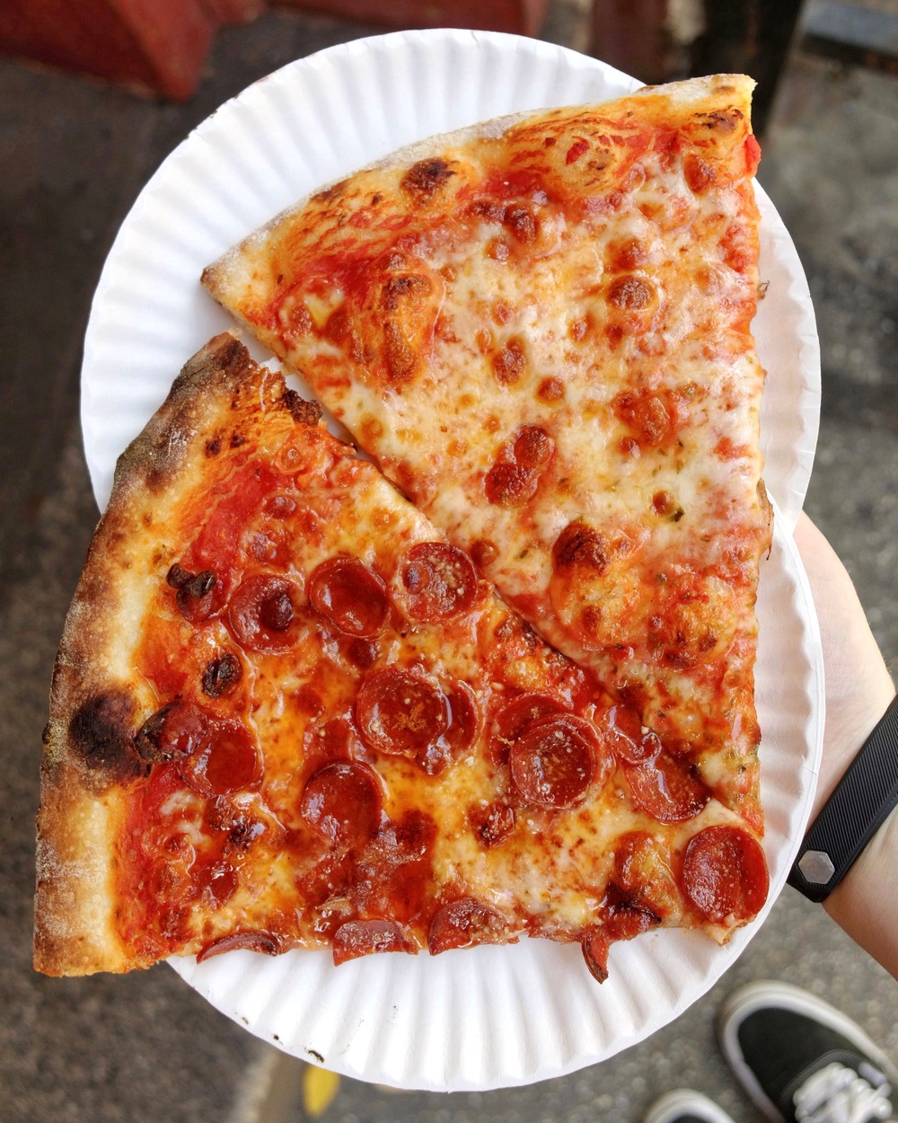 New York-style pizza has become the slice to be seen with (Getty/iStock)