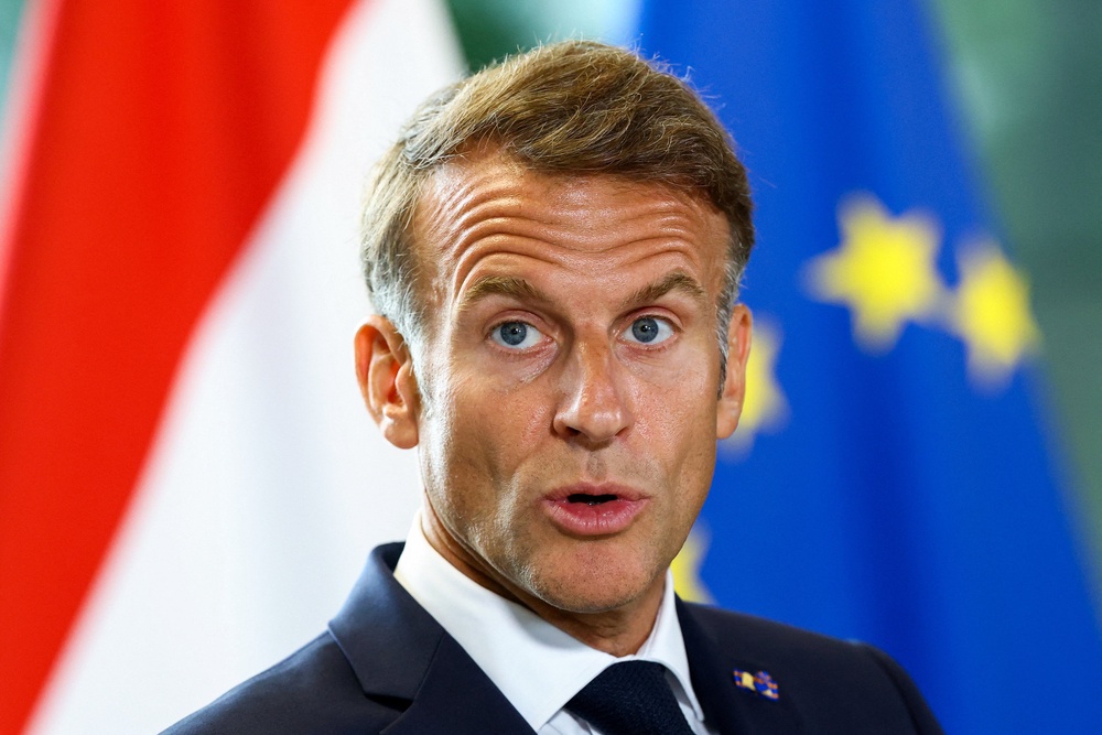 French President Emmanuel Macron is in the UK for talks with prime minister Andy Burnham (Reuters)