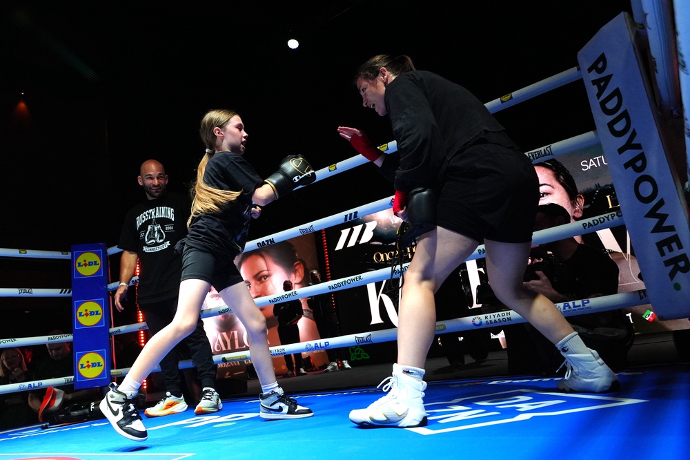 Clodagh Keating, aged 10, got to step in the ring with Katie Taylor (Brian Lawless/PA) (PA Wire)