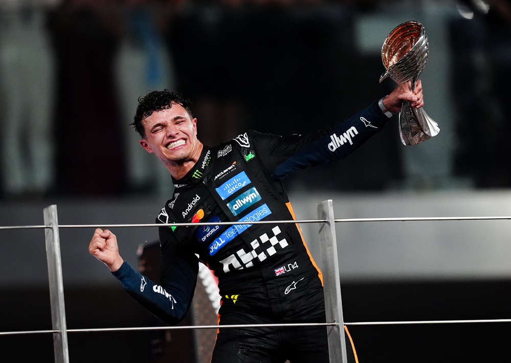 Norris celebrates winning the Formula One world championship (David Davies/PA) (PA Archive)