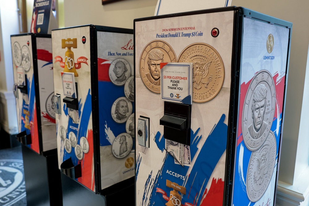 The coins, available in vending machines at the US Mint, break from decades of democratic norms against putting living presidents on currency (Reuters)