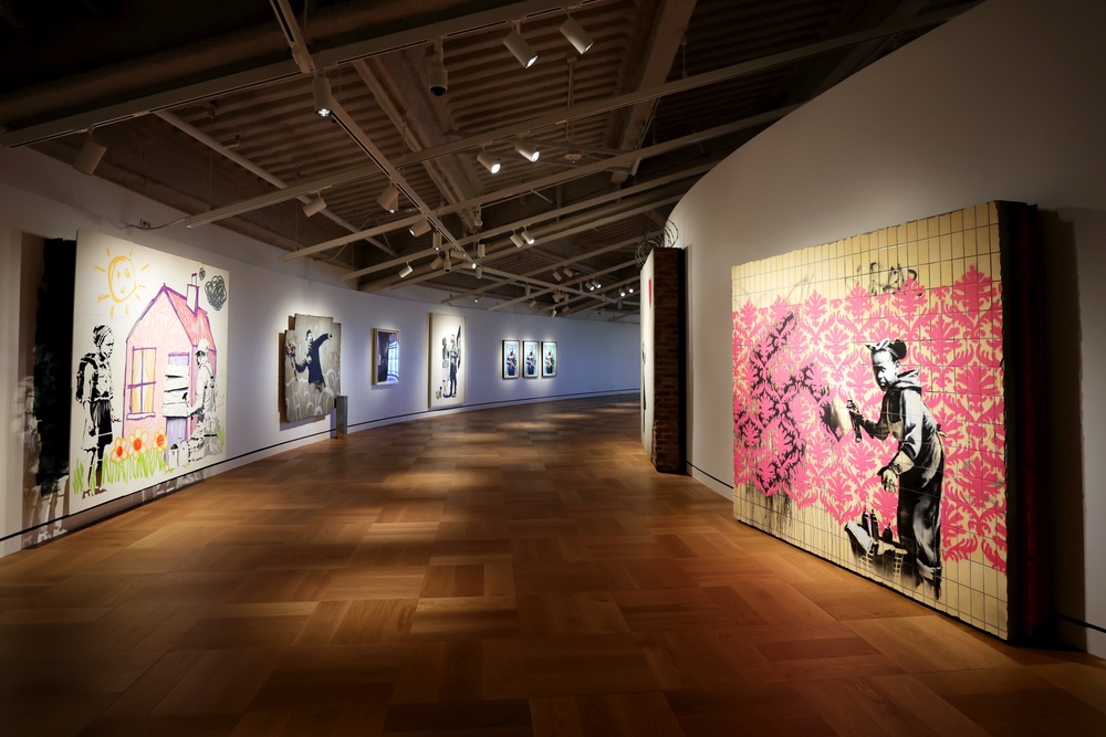 British street artist Banksy personally installed his work in a gallery dedicated to murals at the Lucas Museum of Narrative Art (Stefanie Keenan/Getty Images for Lucas Museum of Narrative Art)