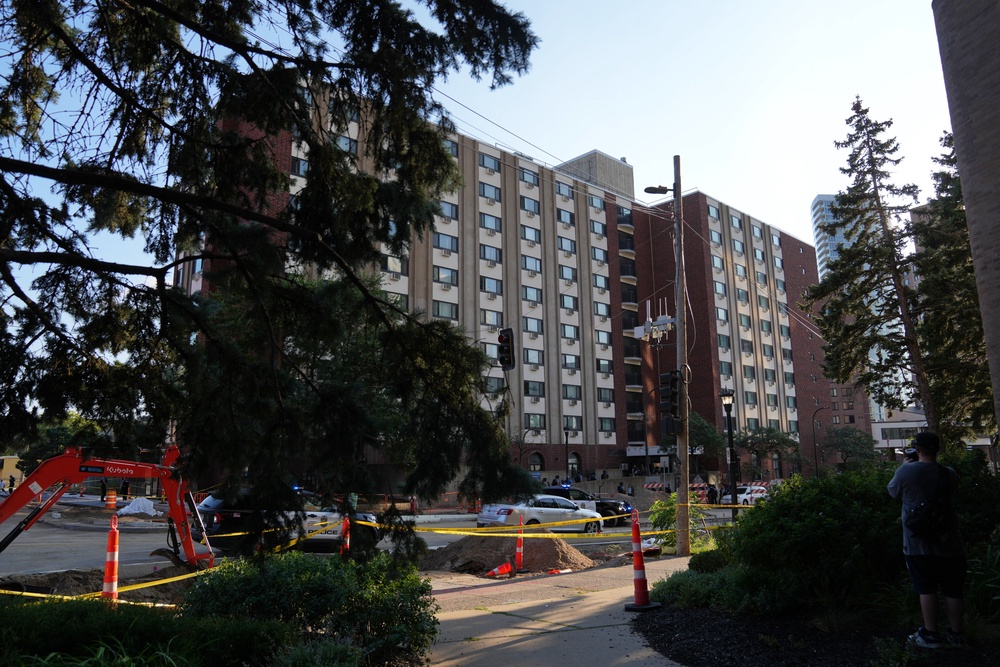 One police officer was shot in the leg and another in the stomach, according to reports (AP)