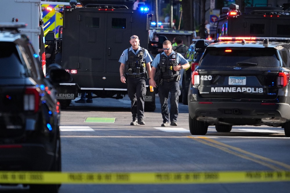 Minnesota Governor Tim Walz said the state 'is praying for our first responders' (AP)