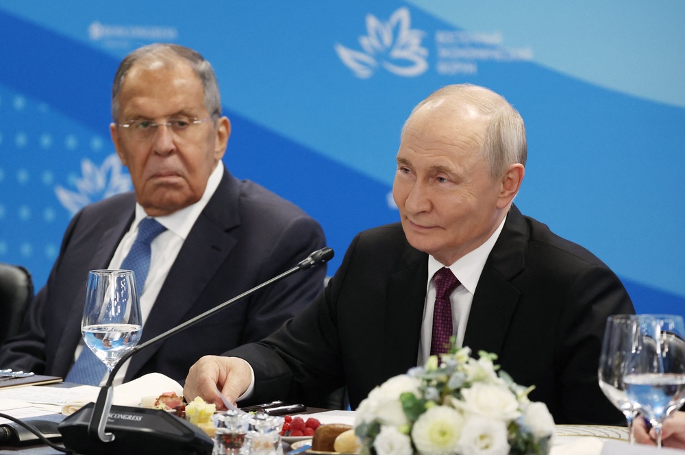 In this pool photograph distributed by the Russian state agency Sputnik, Russia's President Vladimir Putin, accompanied by Foreign Minister Sergei Lavrov, attends a meeting with Indonesian President on the sidelines of the Eastern Economic Forum in Vladivostok on September 3, 2026. (Photo by Vyacheslav PROKOFYEV / POOL / AFP via Getty Images) (AFP/Getty)