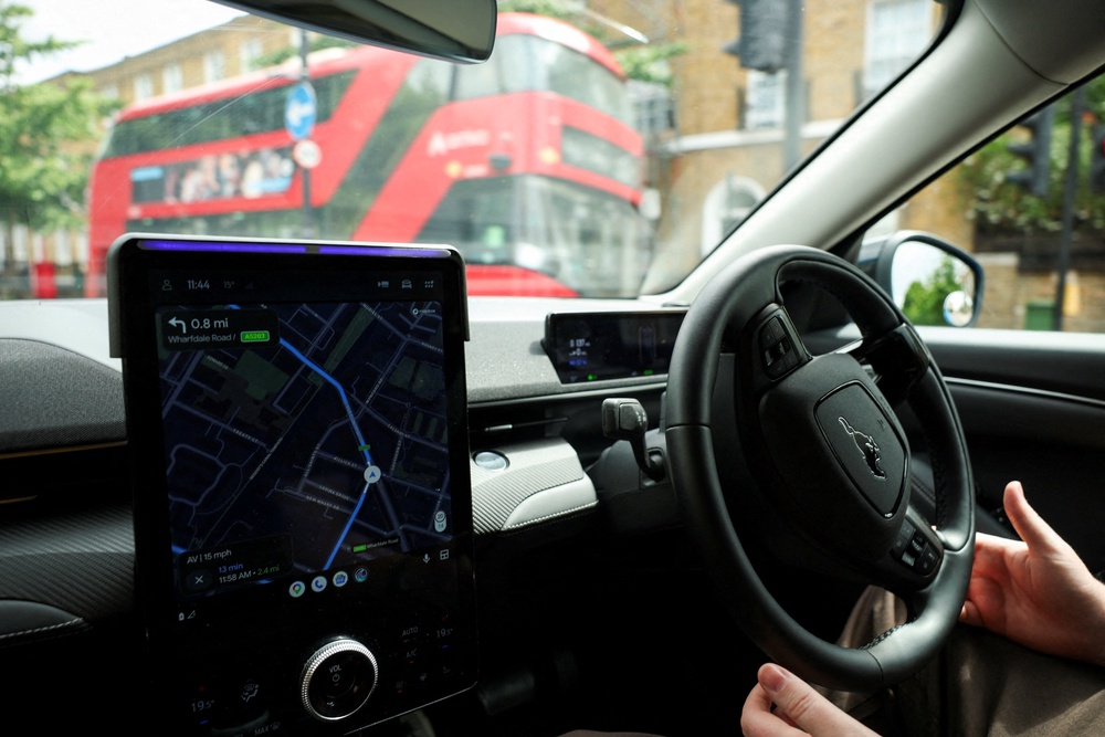 A Wayve autonomous car drives through a residential street during a technology demonstration as the self-driving start-up prepares to announce plans to launch autonomous rides on Uber, in London, Britain, June 5, 2026. REUTERS/Isabel Infantes/File Photo (Reuters)