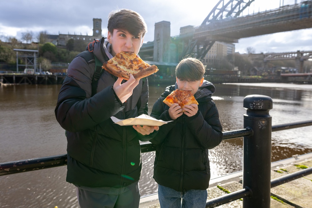 Saucy and scenic: many sliced pizza parlours lack seating – but customers are happy to chow down standing up (Getty/iStock)
