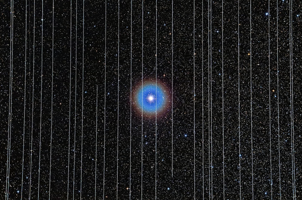 SpaceX's Starlink satellites recorded in a 2.5-minute exposure of the double star Albireo in Cygnus captured on 26 December 2019 (Rafael Schmall/Wikimedia Commons)