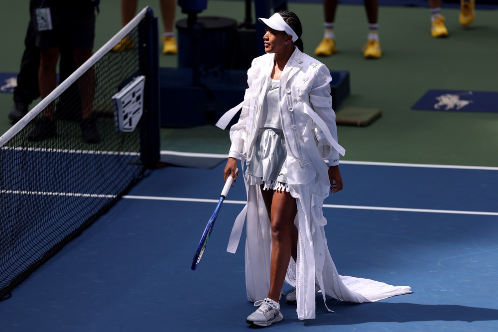 Osaka took to the court in a dramatic silver ensemble (Getty)