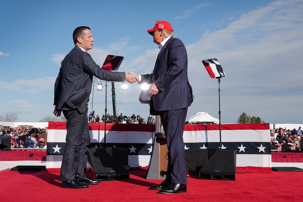 Trump campaigns on behalf of then-Ohio Senate candidate Bernie Moreno near Dayton International Airport on March 16, 2024 – a cold day on which, contrary to his recollections, he wore a baseball cap (Getty)