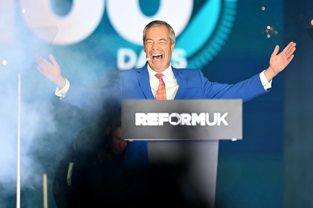 Nigel Farage gave an upbeat conference performance despite the chaos engulfing the party (AFP/Getty)
