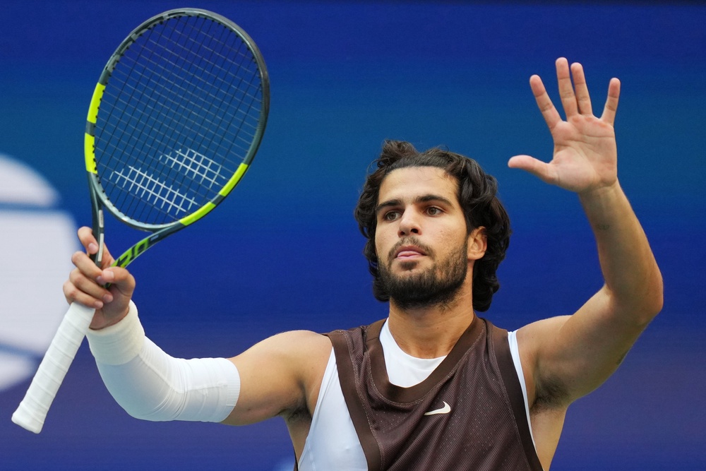 Alcaraz wore a vest to cover his modesty at Flushing Meadows (Kirsty Wigglesworth/AP) (AP)