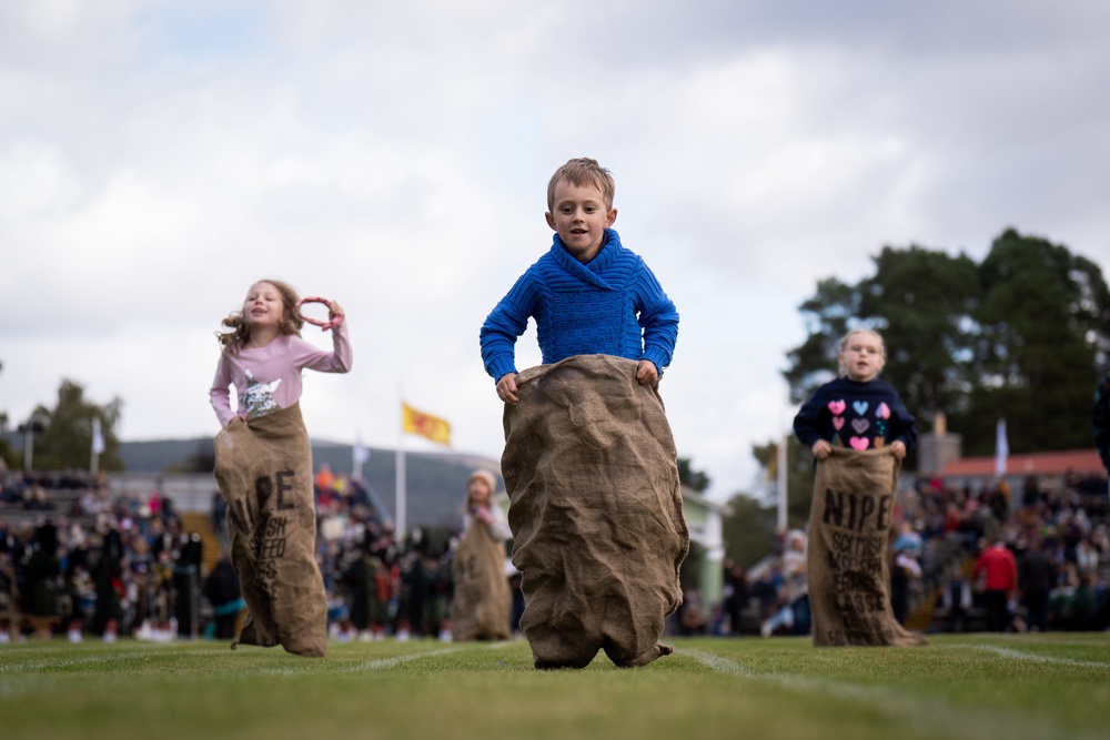 Another event for the children is the traditional sack race (Aaron Chown/PA) (PA Wire)