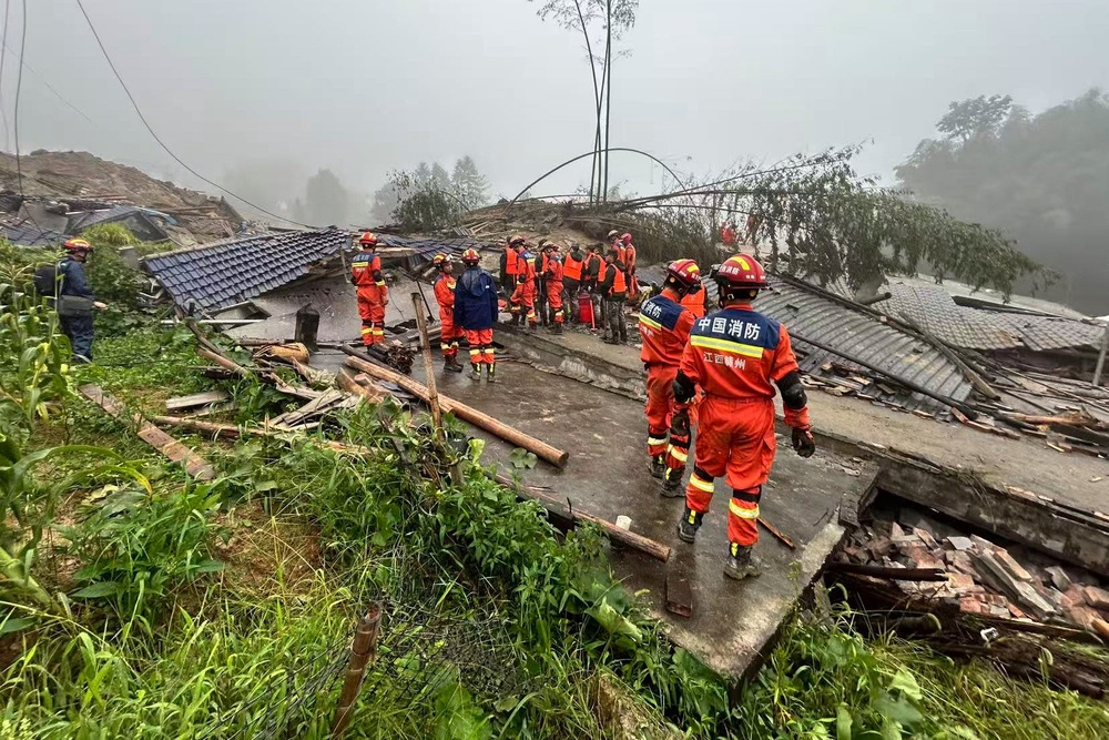 In this photo released by Xinhua News Agency, rescuers conduct a rescue operation at the site of a mudslide following days of heavy rain from tropical cyclone Saudel in Suichuan County of Ji'an City, east China's Jiangxi Province on Saturday, 5 Sept 2026 (AP)