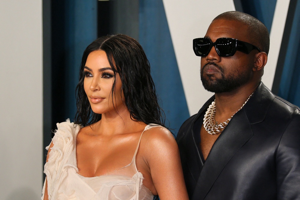 Exes Kim Kardashian and Kanye West, pictured here in 2020, sat on opposite sides of the room to watch their daughter’s show in Chicago (AFP/Getty)