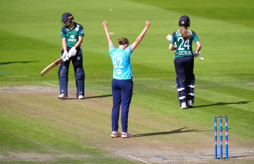 England’s Lauren Filer, centre, celebrates taking the wicket of Ireland’s Gaby Lewis (David Davies/PA) (PA Wire)