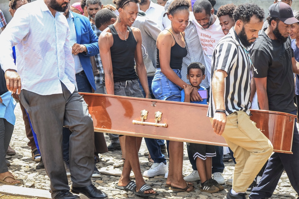 Residents and relatives carry the coffin of one the victims killed in a bus crash during their funeral at Sao Lourenco Church in the town of Sao Lourenco, on the island of Fogo (AFP/Getty)