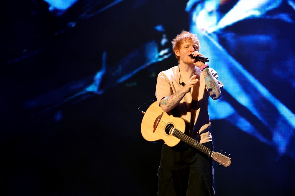 Macklemore is scheduled as the support act for eight more dates on Sheeran’s Loop tour in the U.S. until November (Getty)