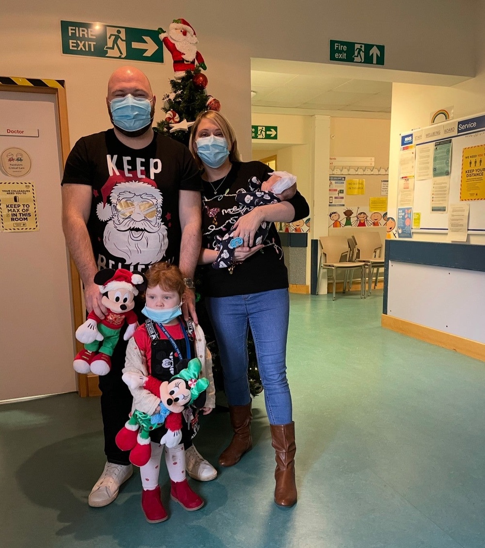 Joey with his mum Sam, dad Steven, and sister Carly at Christmas (PA)