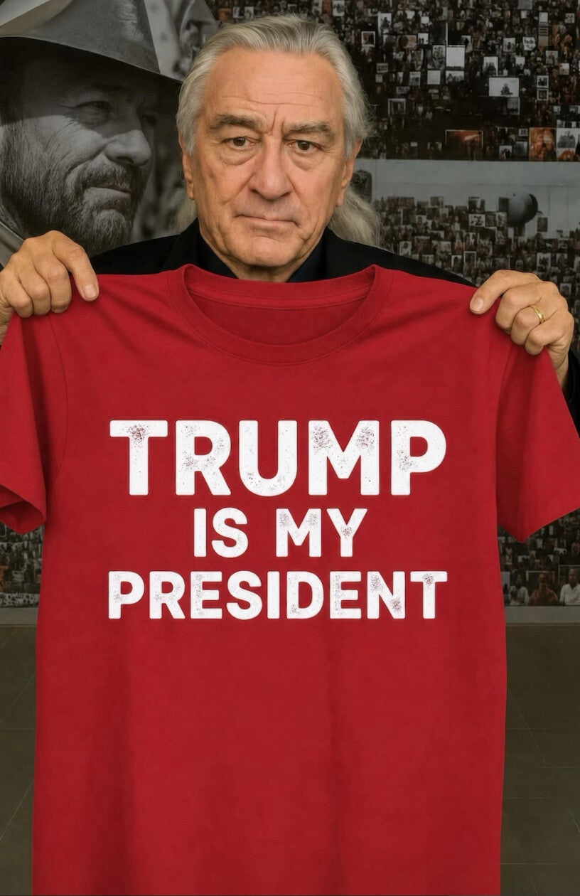 The image, posted by the Republican president on Truth Social on Sunday, shows Robert De Niro holding up a red shirt that reads: “TRUMP IS MY PRESIDENT” (@RealDonaldTrump, Truth Social)