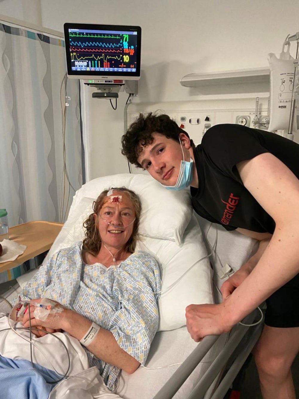Trish Gordon and her son, Brodie, after her second surgery in 2022 (Scottish Bridge Union/PA)