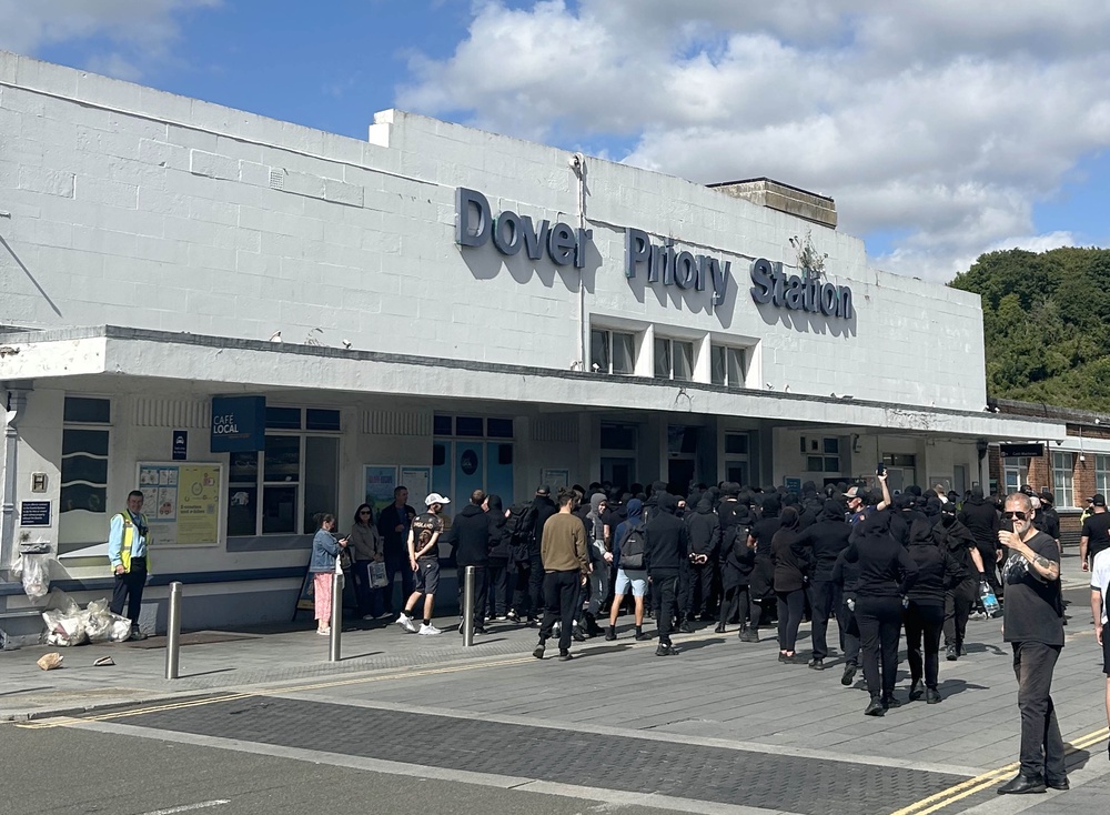 Protesters at Dover Priory train station after black-clad and masked anti-illegal migrant demonstrators blocked roads in the port (Oscar Rihll/PA Wire/PA Images) (PA Wire)
