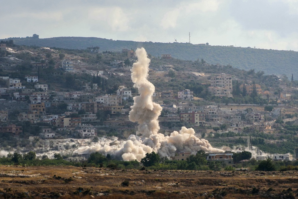 This photograph taken from the southern Lebanese village of al Hanniyeh shows smoke as it rises from the site of an Israeli-controlled explosion in the nearby village of Al-Mansouri (AFP/Getty)