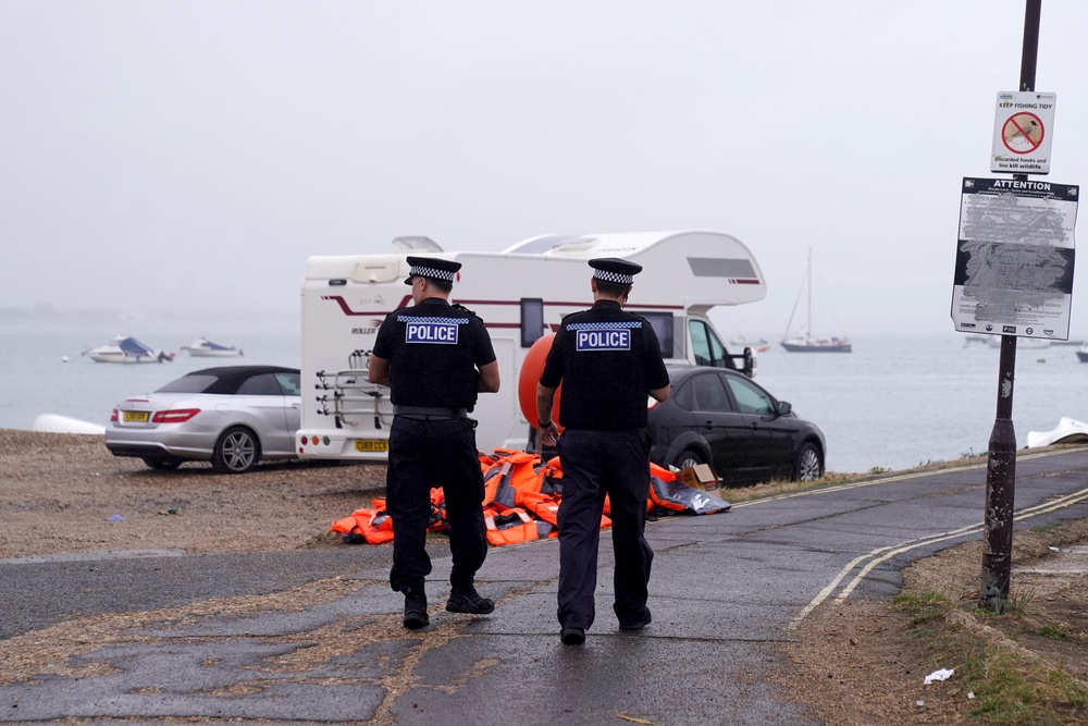 Danny Tommo filmed himself approaching emergency services on Portsmouth beach, telling them not to help migrants rescued from the Hampshire coast on Sunday (PA)