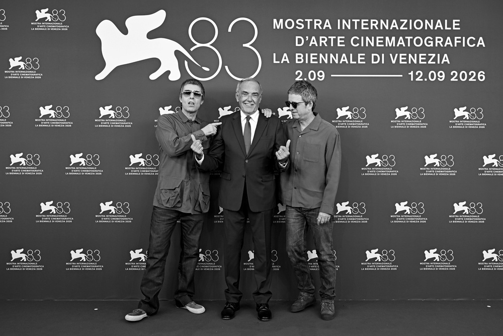 Liam and Noel Gallagher with Alberto Barbera, artistic director for the documentary ‘Don’t Look Back in Anger’, at the Venice Film Festival 2026 (Getty)