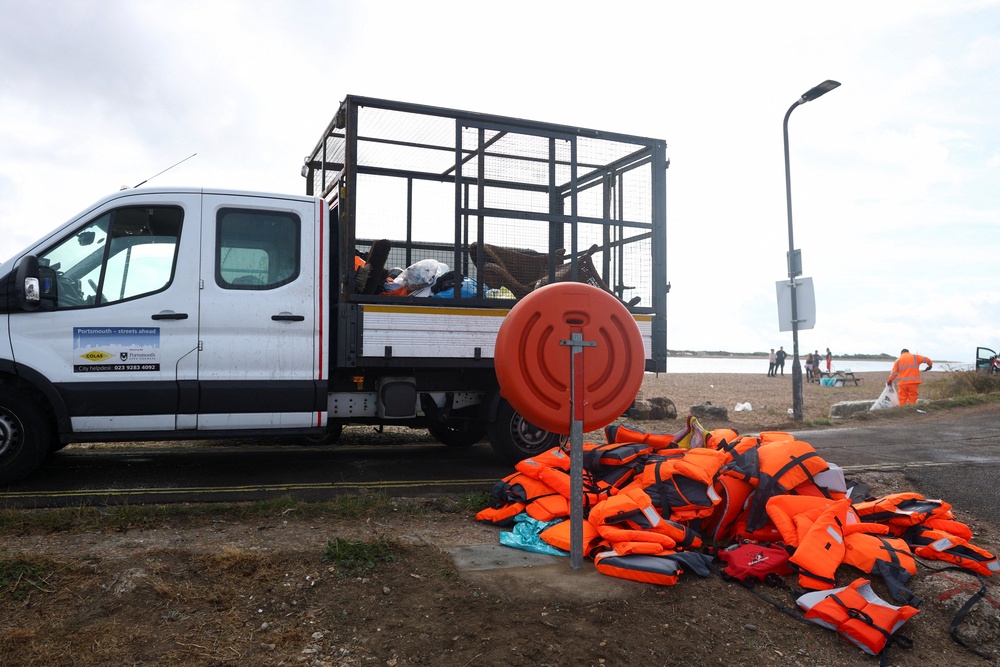 A pile of lifejackets at Eastney Ferry Landing, following anti-immigration protests, in Portsmouth (Reuters)