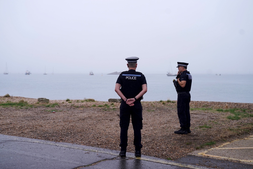 The landing site the migrants were taken to by the RNLI is on a narrow shingle bank (PA) (PA Wire)