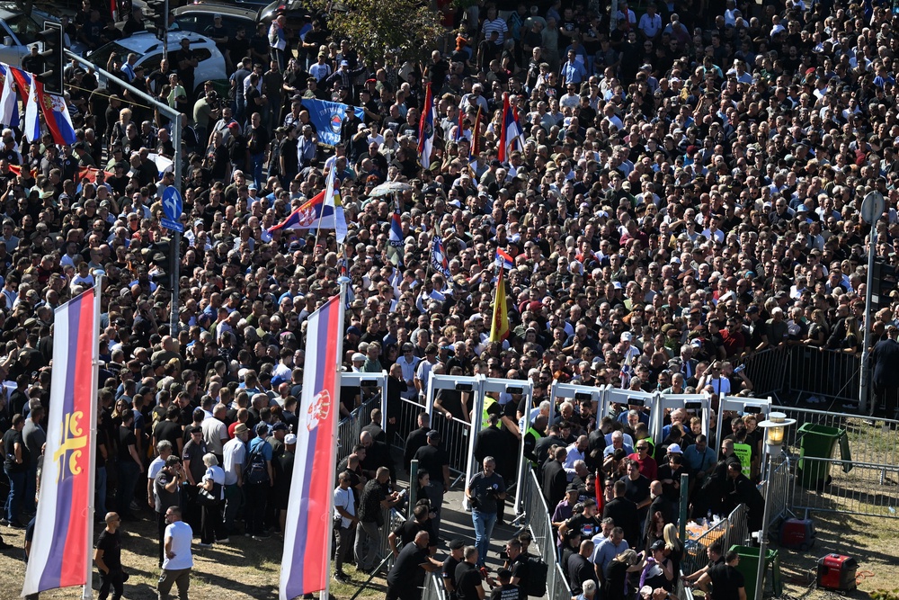 Mourners queue as they arrive to take part in a public memorial on the day of the funeral ceremony (AFP/Getty)