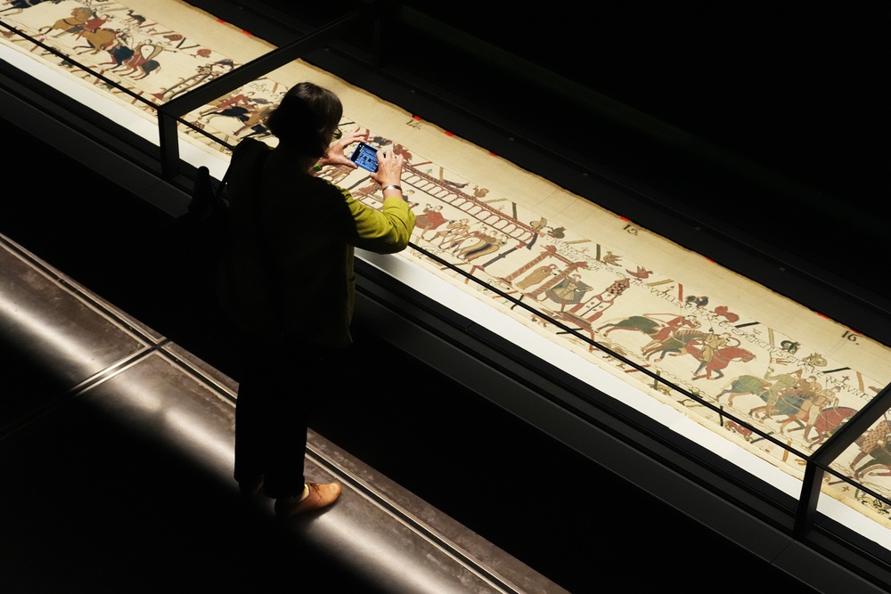 The 70-metre tapestry was being unveiled to the public on Thursday (Jonathan Brady/PA) (PA Wire)