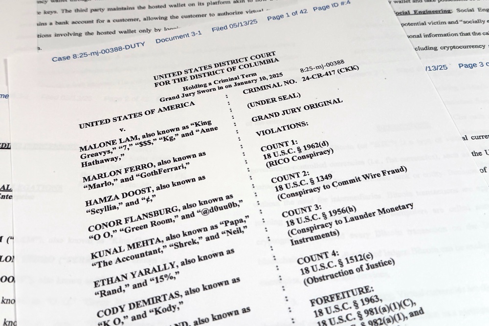 This Justice Department grand jury superseding indictment against Malone Lam and his co-defendants is photographed Friday, Sept. 4, 2026. (AP Photo/Jon Elswick) (Copyright 2026 The Associated Press. All rights reserved.)