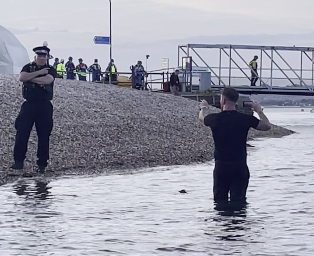 Daniel Thomas, known as Danny Tommo, live streams during the operation to rescue the migrants in Portsmouth (PA)