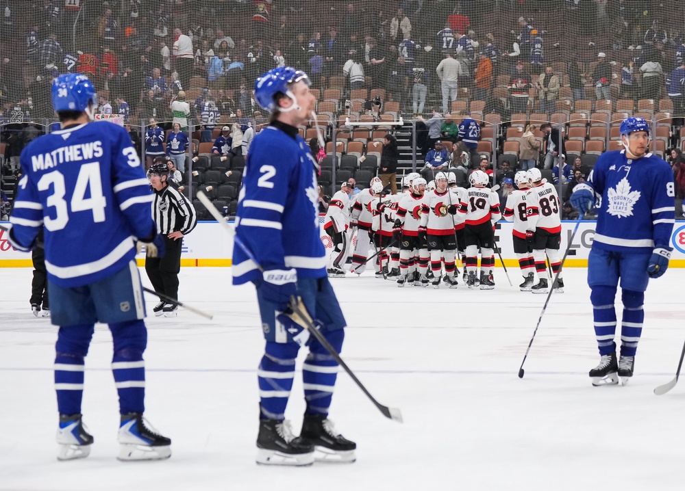 The Ottawa Senators celebrate after a 5-2 win as the Toronto Maple Leafs skate off the ice at Scotiabank Arena (Getty)