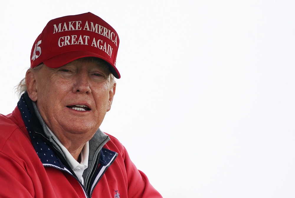 Donald Trump on the fourth hole at Trump International Golf Links & Hotel in Doonbeg, Co. Clare, during his 2023 visit to Ireland (Brian Lawless/PA) (PA Archive)