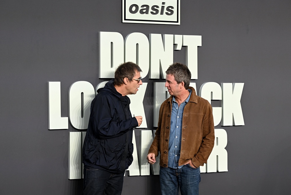Liam Gallagher (left) and Noel Gallagher (right) have been described as ’emotional’ about their reunion (Doug Peters/PA) (PA Wire)