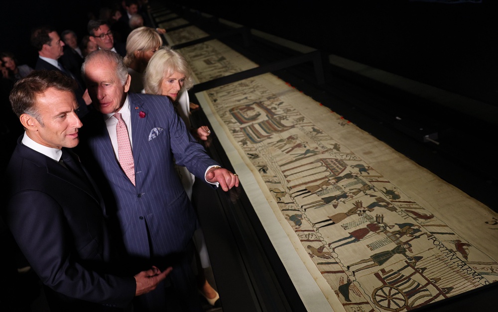 Charles talks to French President Emmanuel Macron during a visit to view the Bayeux Tapestry Exhibition at the British Museum in September 2026 (Adrian Dennis/PA) (PA Wire)