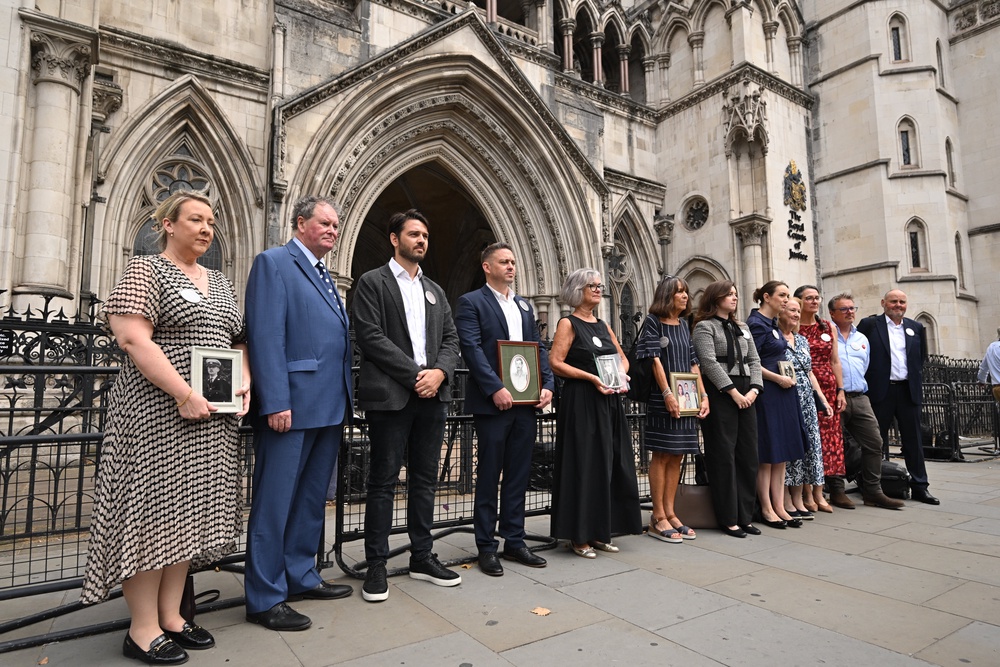 Families from the Chinook Justice Campaign outside the Royal Courts of Justice in July (Doug Peters/PA) (PA Wire)