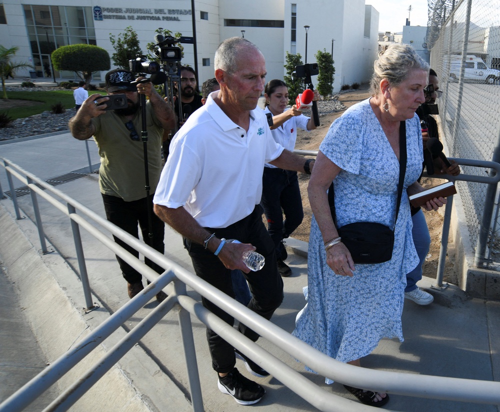 Debra and Martin Robinson arrive to attend the trial in Mexico (Reuters)