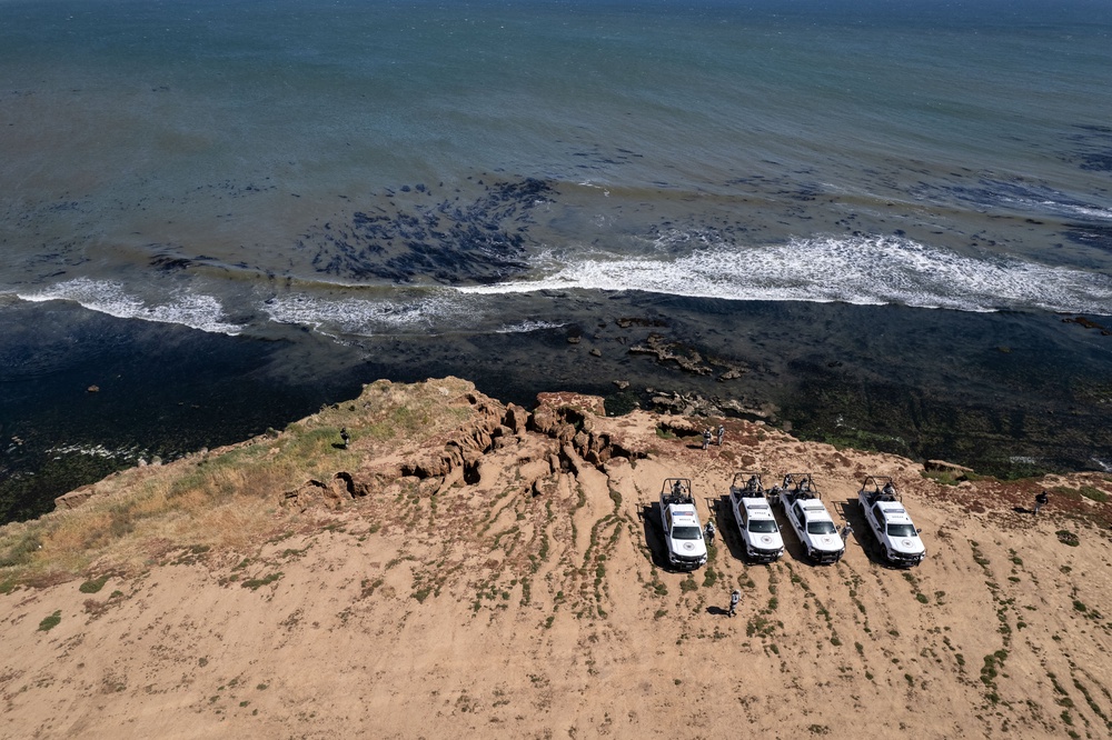National Guard vehicles during a search at the site where the three surfers were camping before disappearing in El Faro, Baja California (AFP/Getty)