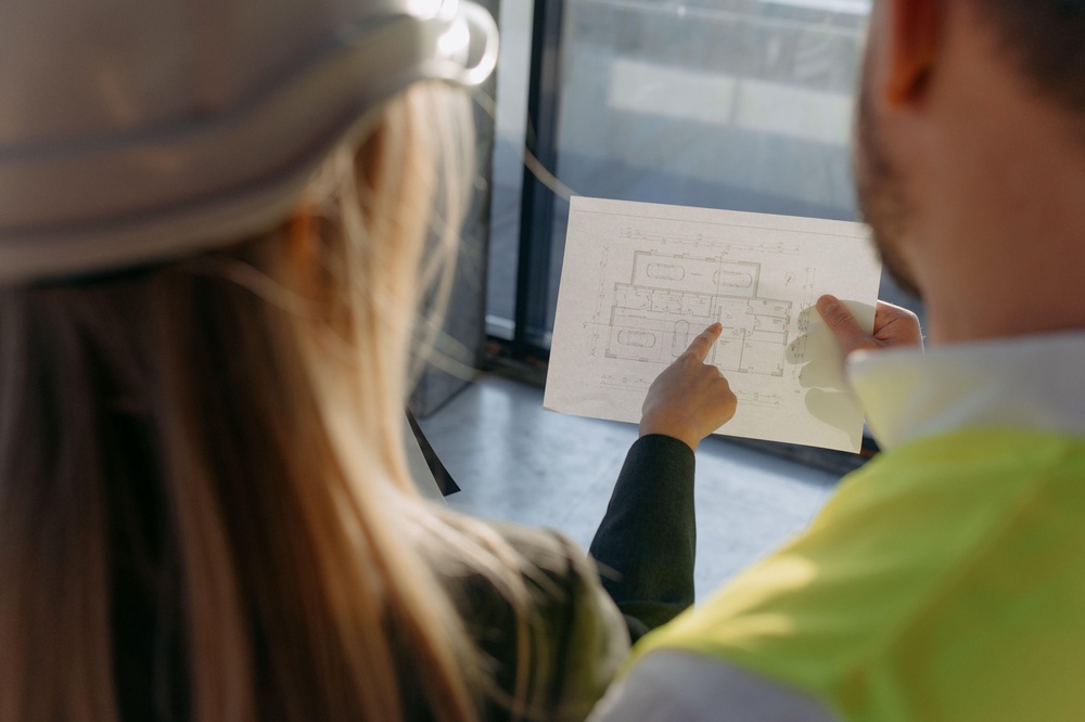 A couple studying a house project (Alamy/PA) (Alamy/PA)