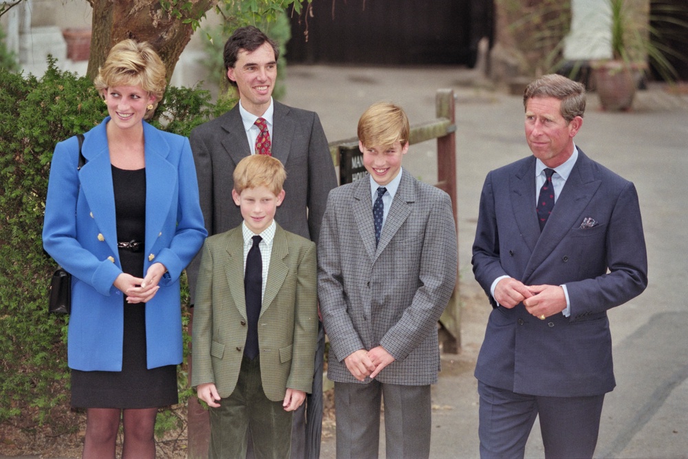 Prince William begins his time at Eton College on 6 September 1995, flanked by his mother Diana, brother Harry and father Charles (Getty)