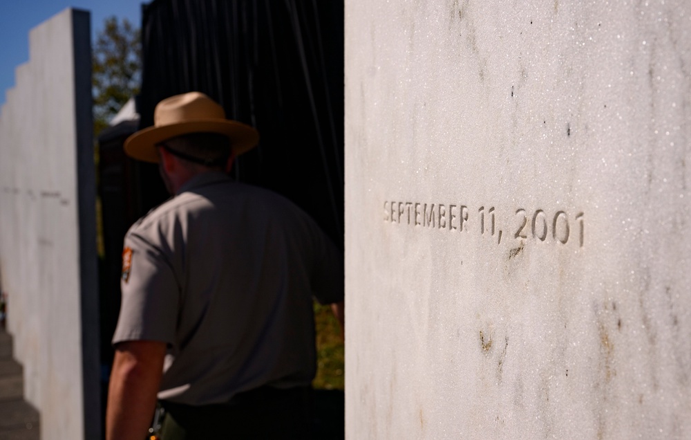 A US Park Service Ranger stands at the Wall of Names following the memorial ceremony at the Flight 93 National Memorial (Getty)